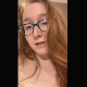 A cute redhead girl wearing glasses records herself from a between the legs perspective as she takes a shit and piss into a toilet. Some vaginal discharge at the end. Vertical HD format video. About 2 minutes.